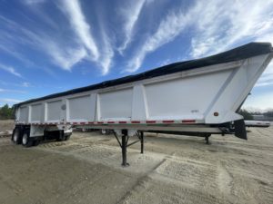 2000 MAC ALUMINUM 39' END DUMP with manual slide tarp located @ Brazos Trailers in Wills Point. Call 430-540-3400